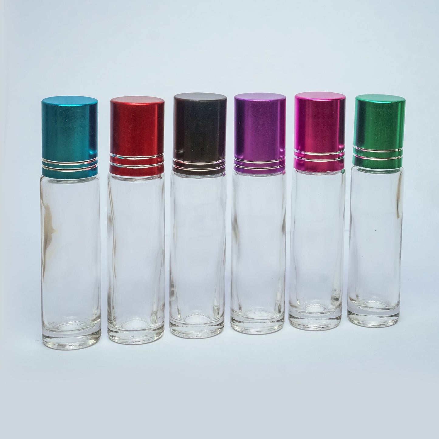 ขวดลูกกลิ้งใส(มีขีด) ฝาคละสี 10ML. (โหล)