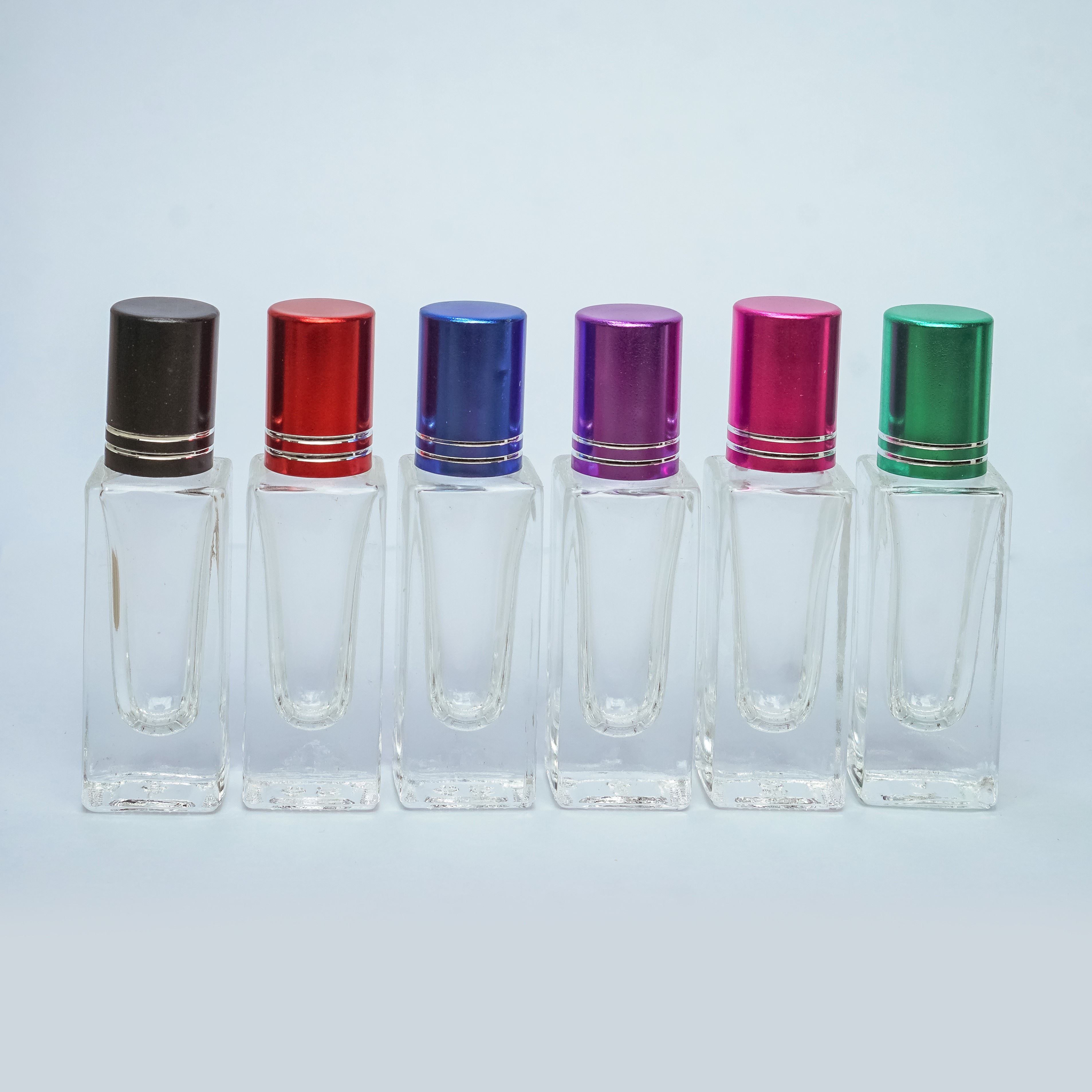 ลูกกลิ้งเหลี่ยมใส6 MLฝาคละสี (F)